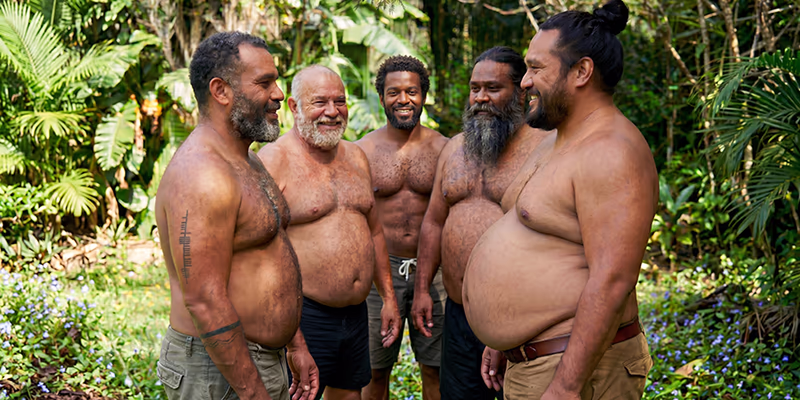 Group of shirtless gay bears seeing each other