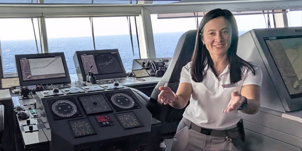 Deputy Captain of a Virgin Voyages Ship giving tour of the bridge