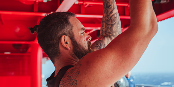Burly bear doing pullups
